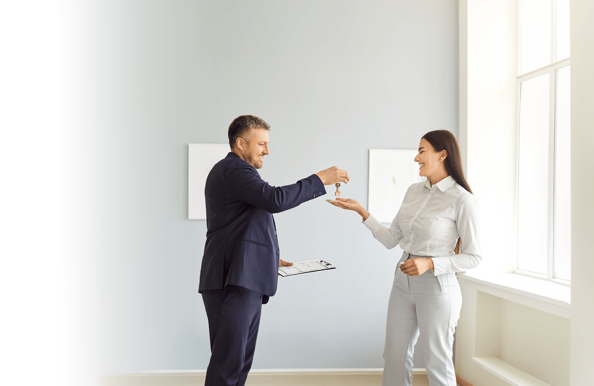 Couple receiving house keys